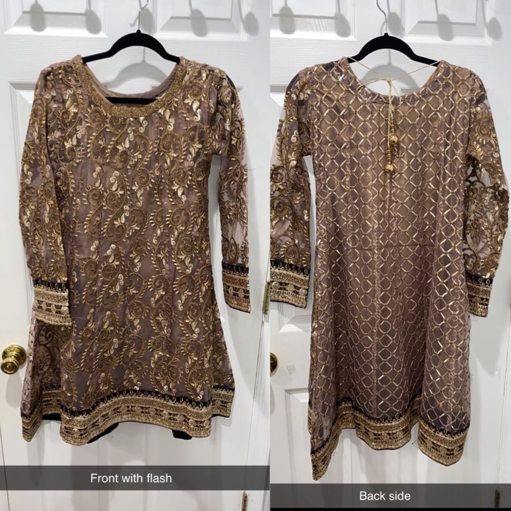Brown dress with gold embroidery.